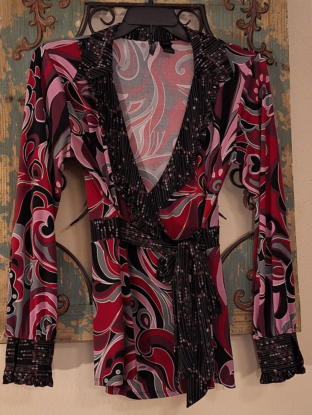 Bisou Bisou Red/Pink Swirl Wrap Blouse.  Great Condition Size Large